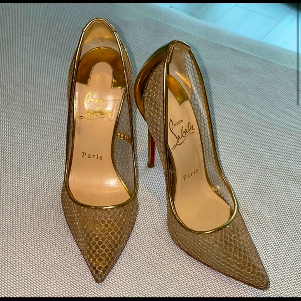 Gold Christian Louboutin. Worn a handful of times.